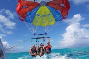 Parasailing adventure above the turquoise waters of Grace Bay